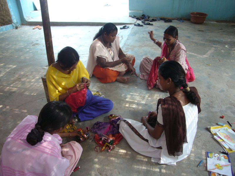 The women of Govind's charity, sewing our rajasthani puppets.